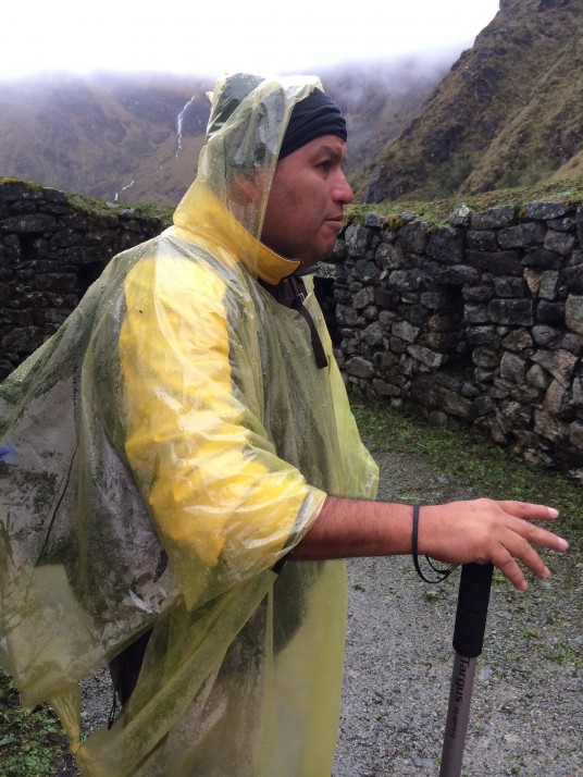 Augusto - assistant guide - explaining the history of some Inca ruins along the way